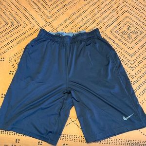 Navy Nike dri-fit above-knee shorts